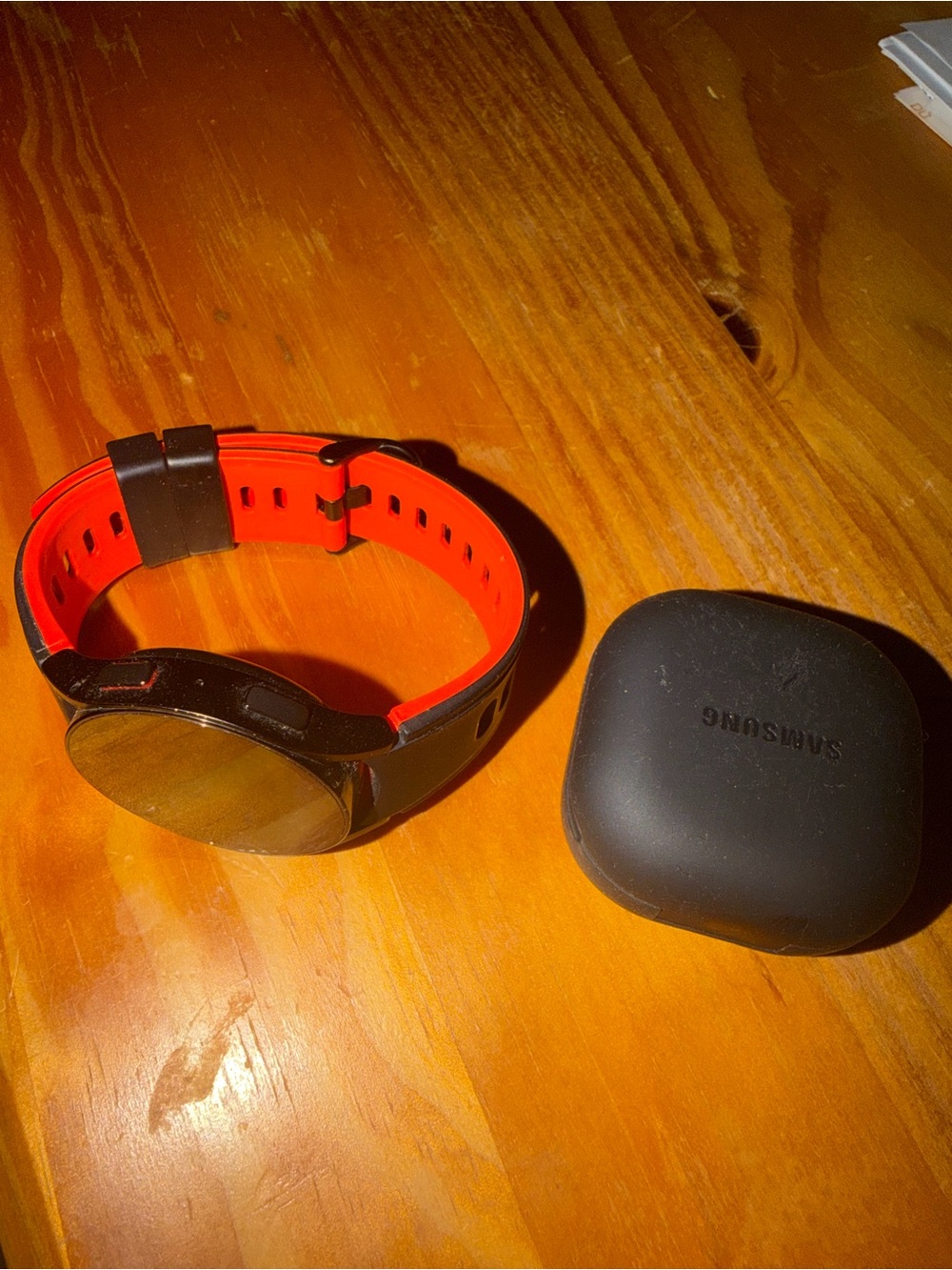 Samsung Black Watch Case with Bright Red Silicone Strap